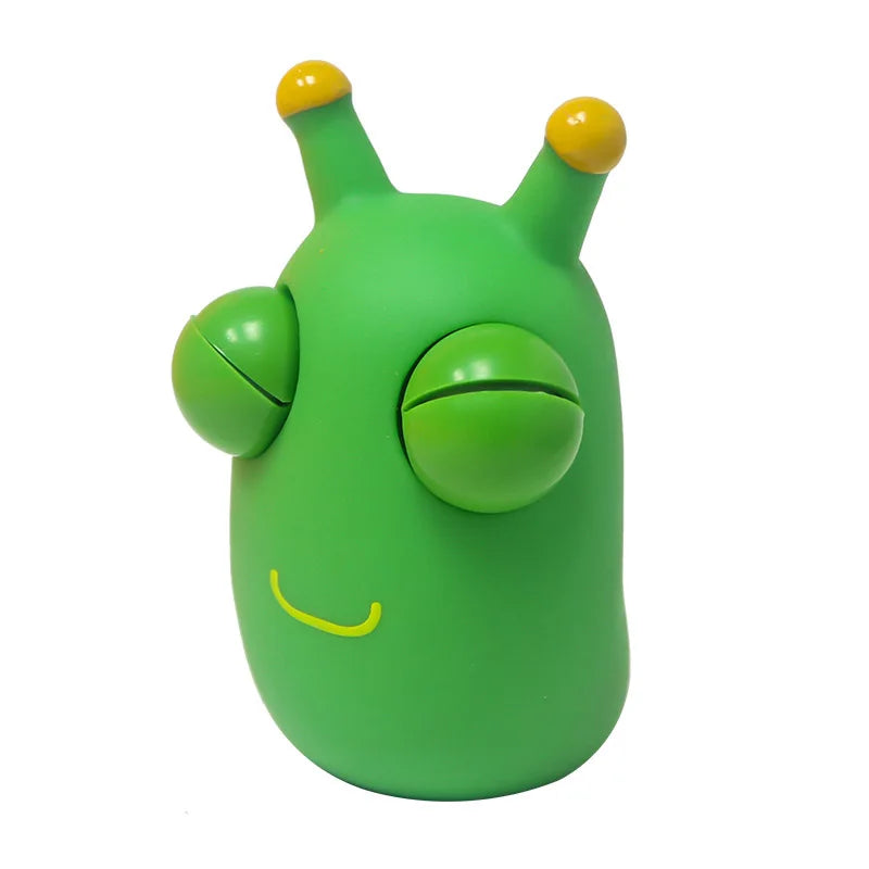Green alien-shaped object with yellow accents on a white background