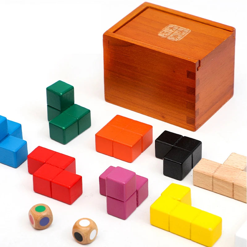 Colorful wooden building blocks and dice set against a white background