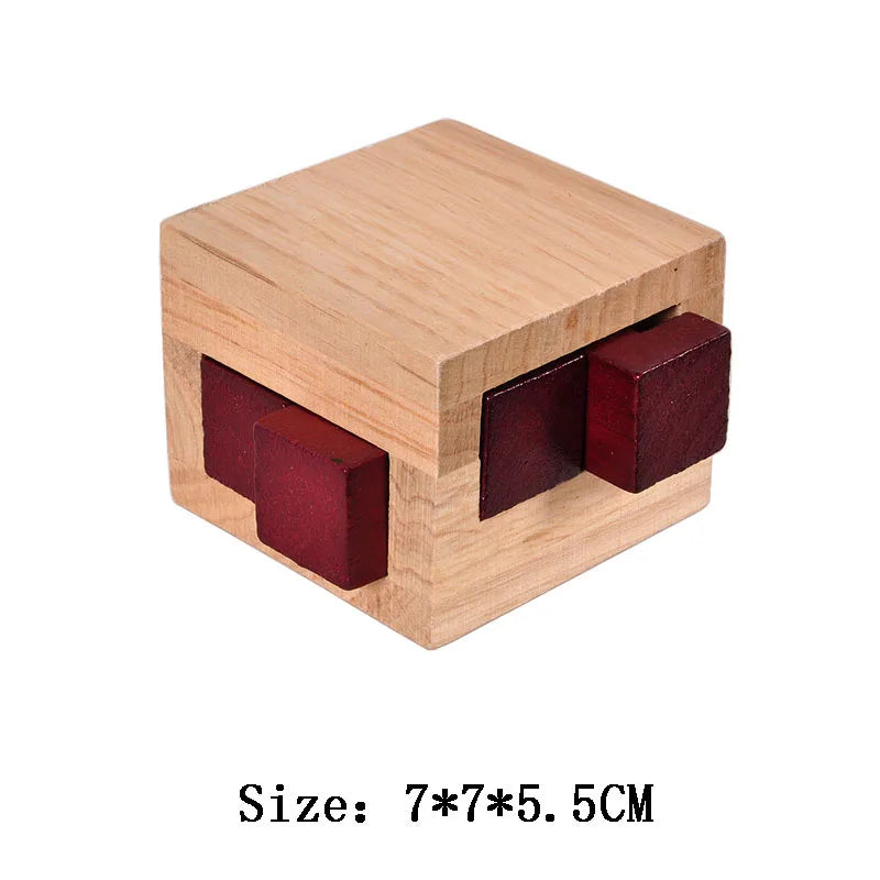 Wooden puzzle cube with red interior on a white background