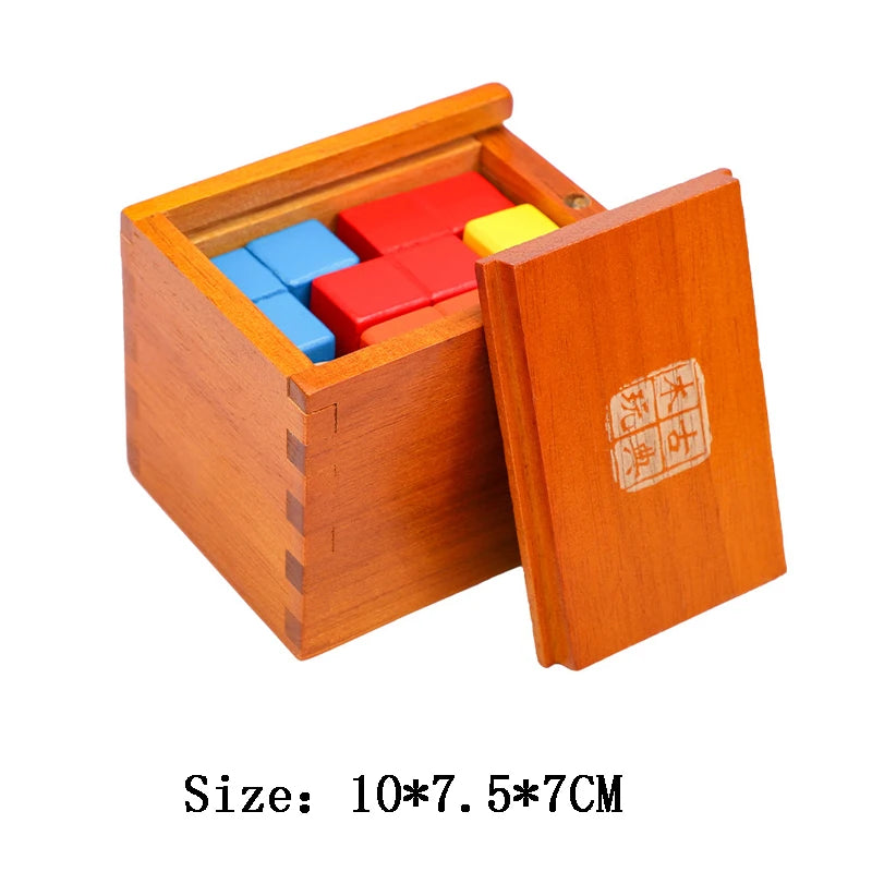 Wooden box puzzle with colorful blocks inside on a white background