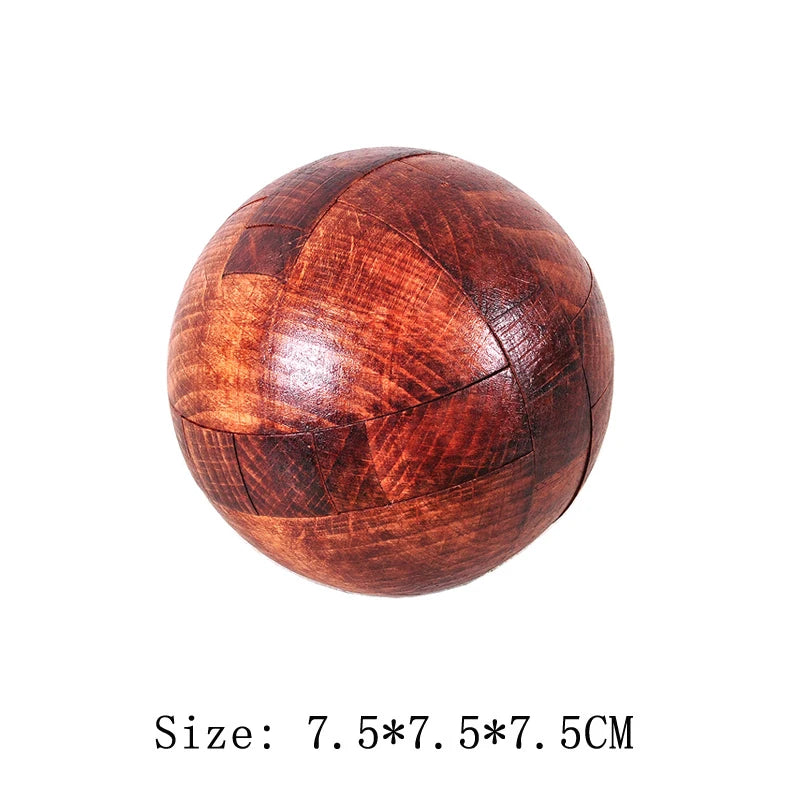 Wooden ball puzzle with a checkered pattern on a white background