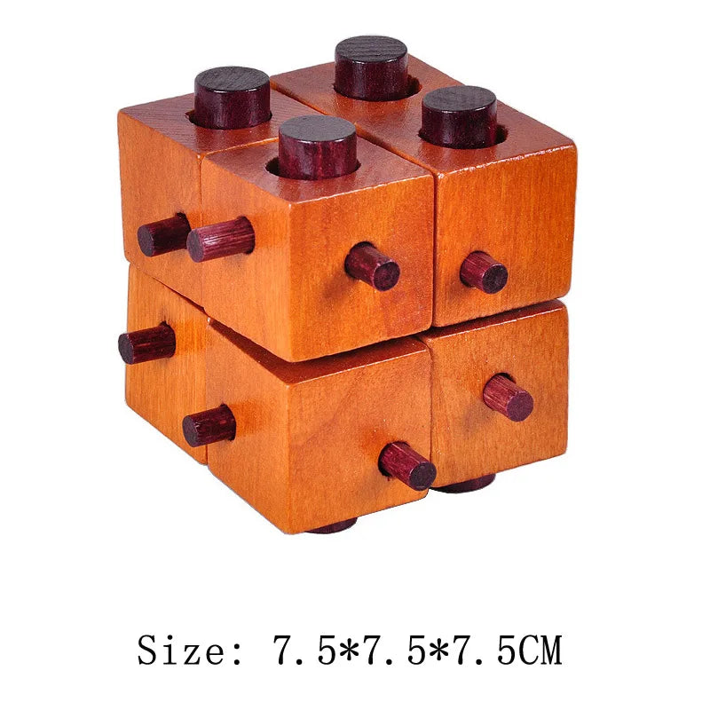 Wooden puzzle cube with red knobs on a white background