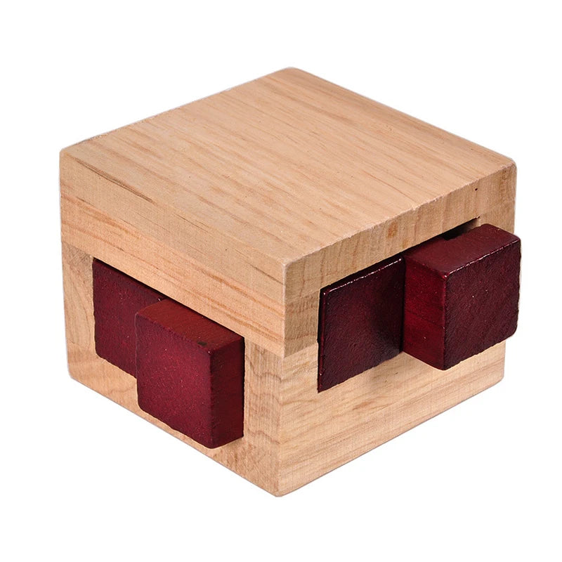 Wooden puzzle box with red interior compartments on a white background