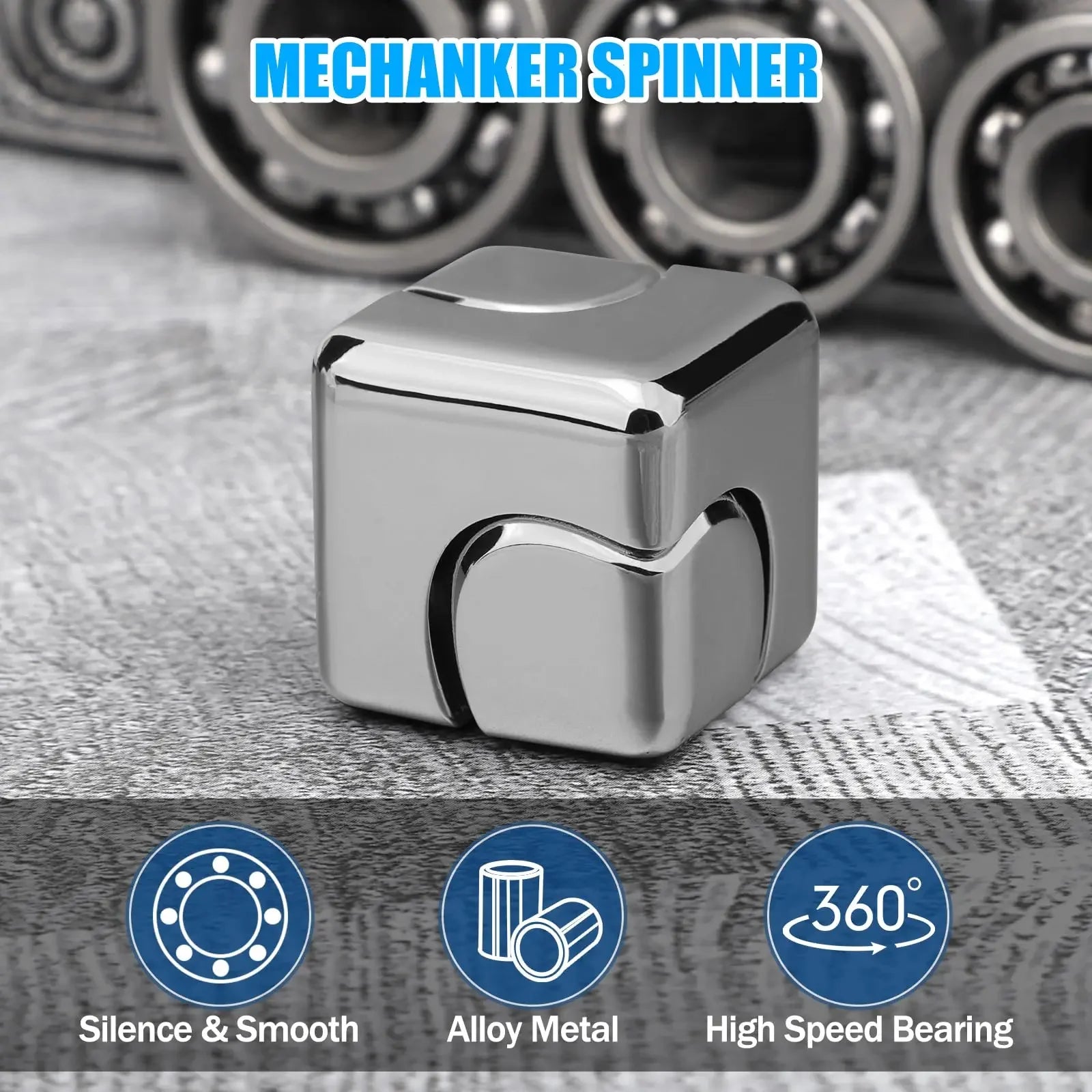 Mechanker spinner with bearings in the background on a textured surface