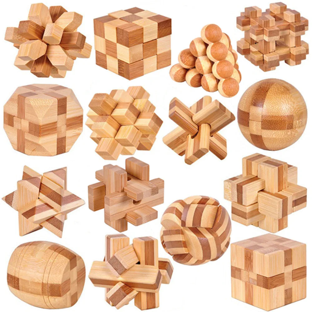 Collection of wooden puzzle toys on a white background