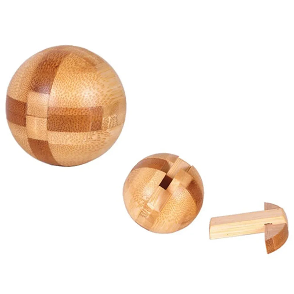 Set of wooden puzzle balls on a white background