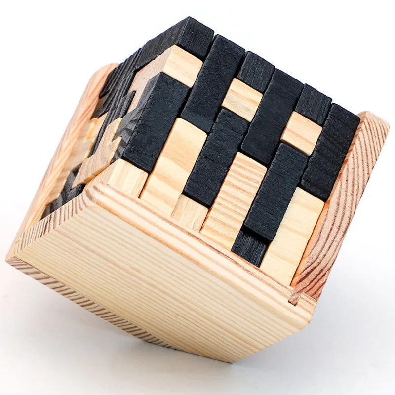 Wooden cube with black woven pattern on a white background
