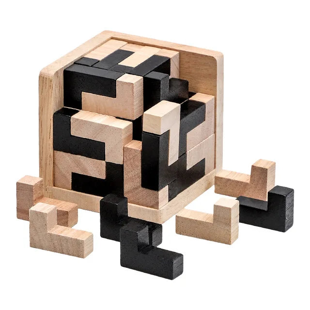 Wooden puzzle with black and natural wood blocks on a white background