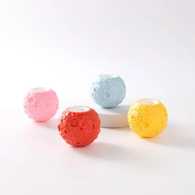 astronaut squeeze toy on colorful planet stress relief