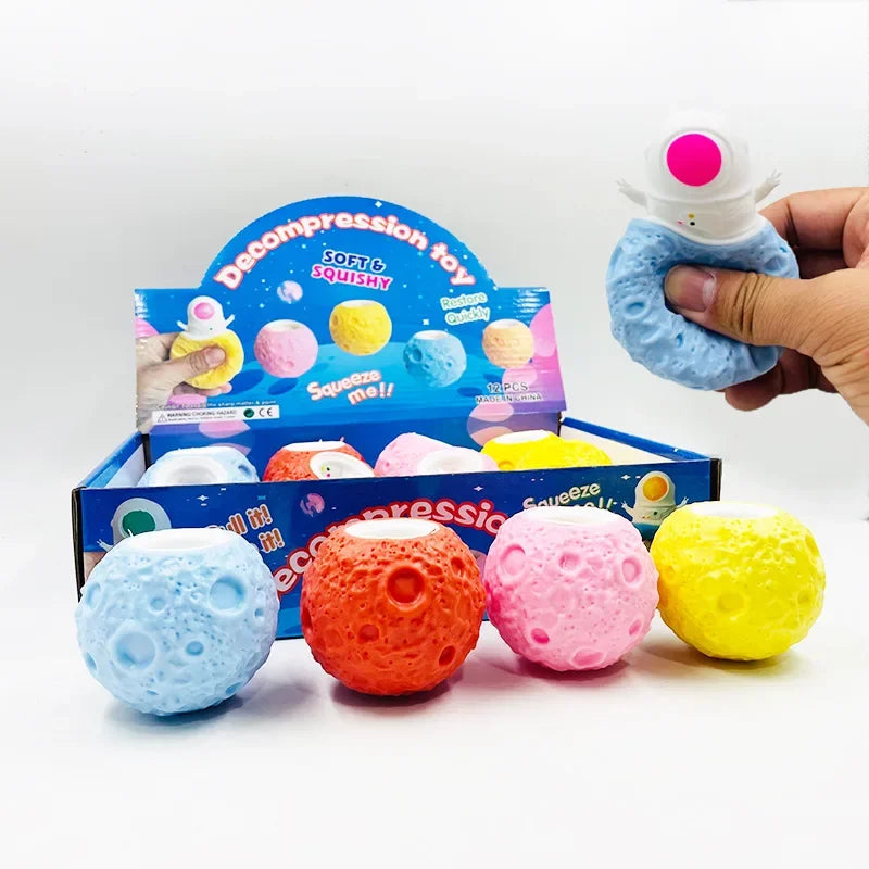 astronaut squeeze toy on colorful planet stress relief